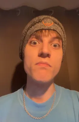 Fan wearing the beanie on the Wall of Gurusalem