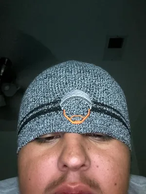 Fan wearing the beanie on the Wall of Gurusalem