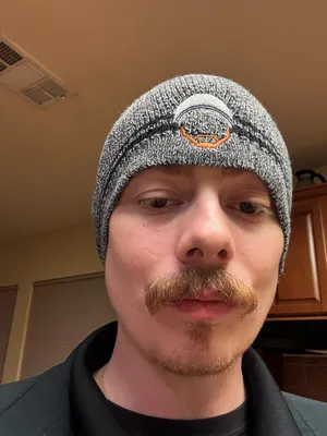 Fan wearing the beanie on the Wall of Gurusalem