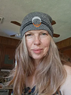 Fan wearing the beanie on the Wall of Gurusalem
