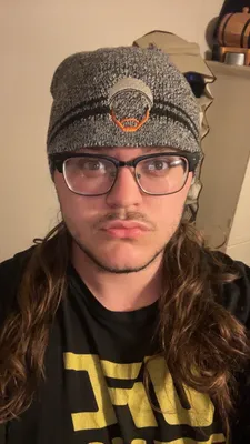 Fan wearing the merch on the Wall of Gurusalem