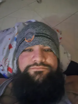 Fan wearing the beanie on the Wall of Gurusalem