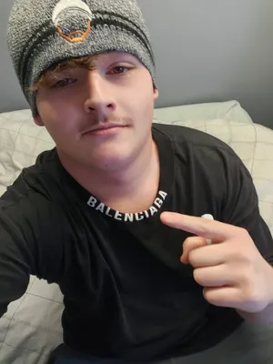 Fan wearing the beanie on the Wall of Gurusalem