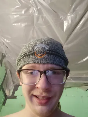 Fan wearing the beanie on the Wall of Gurusalem